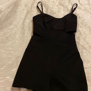 Sexy and elegant black cutout BEBE romper xs